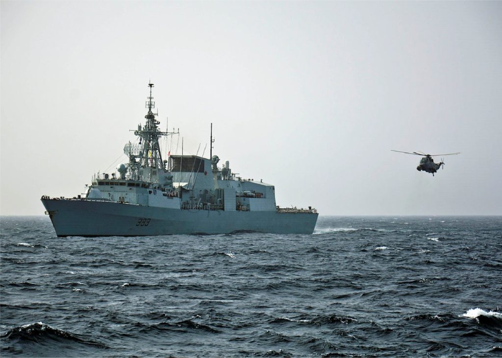 Figure 1 - Frigate in action, with helicopter landing. frigate-helipad-unstructured